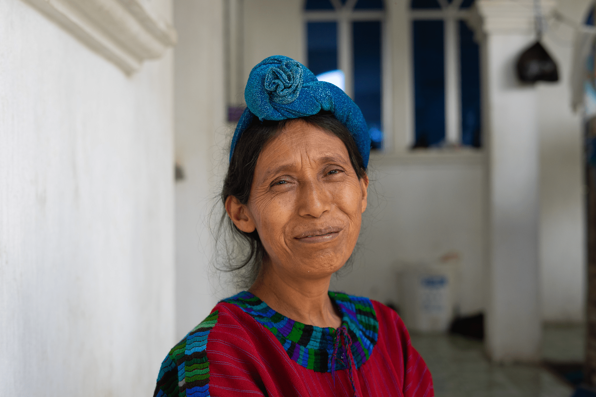 Indigenous Mayan woman smiling.