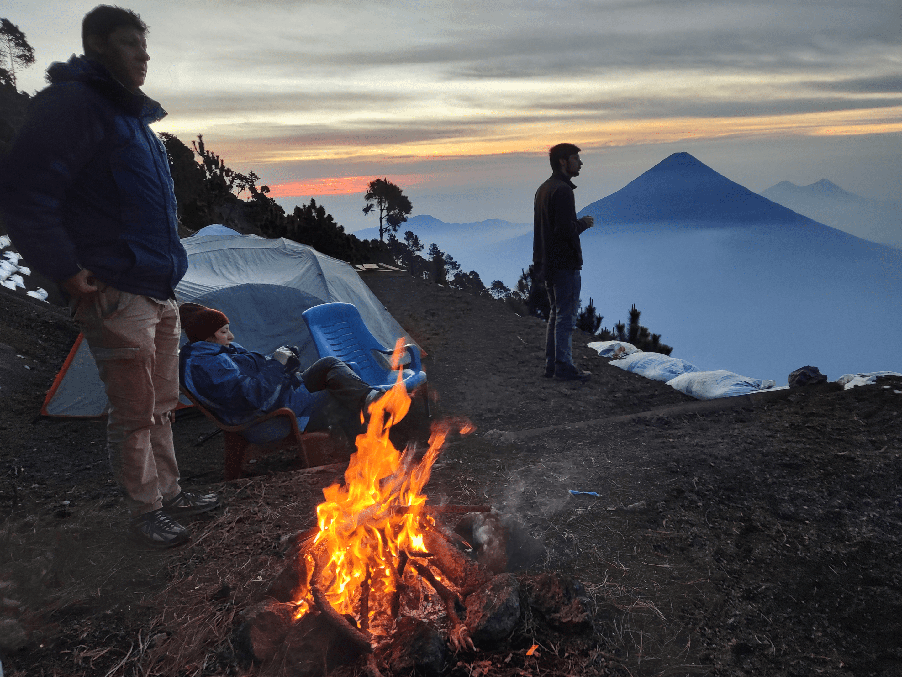 A view of the three volcanoes Acatenango, Fuego, and Pacaya in Central America. Sunrise hikes to the summit are 