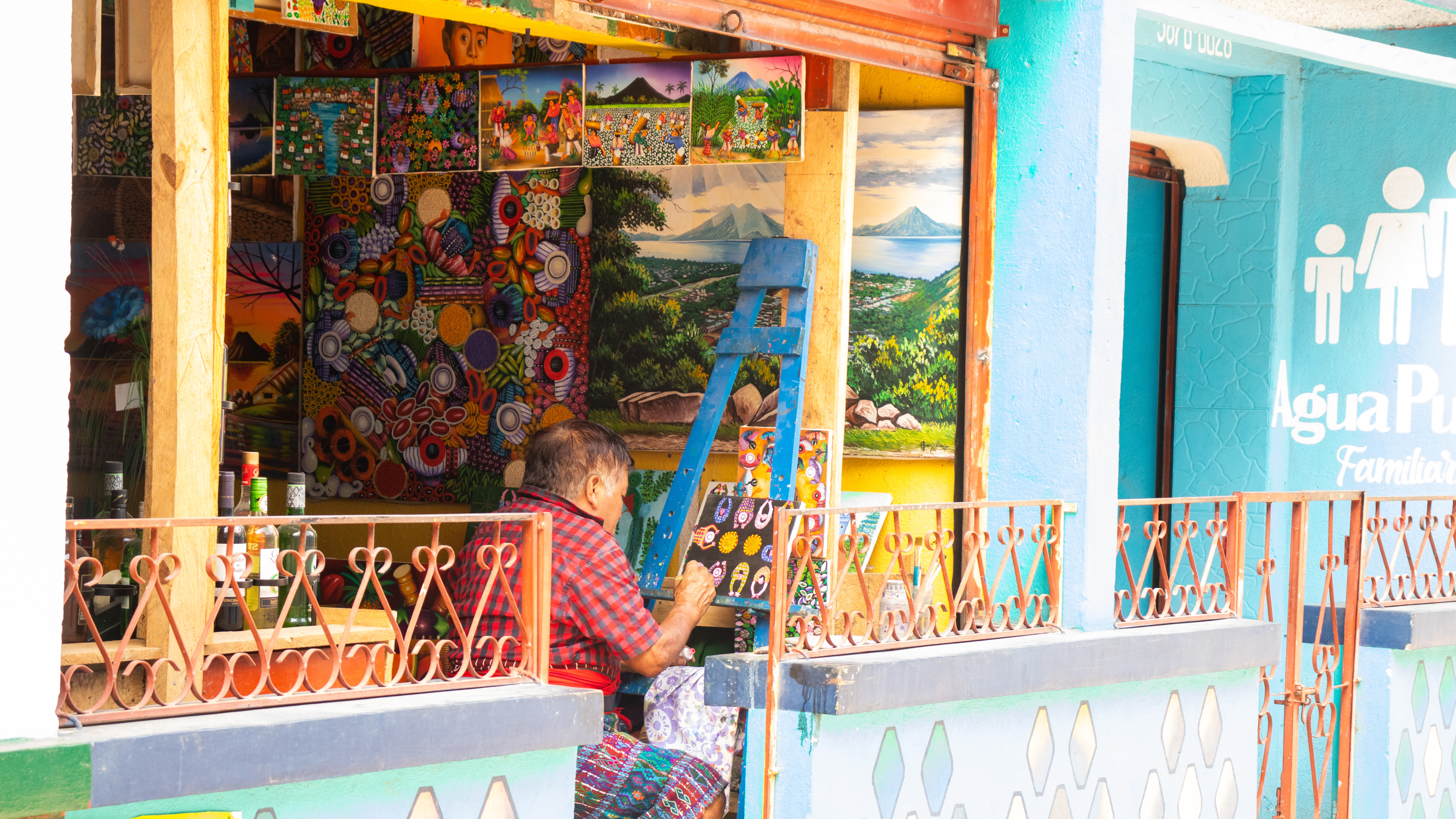 A boat ride around Lake Atitlan with surrounding volcanoes in the background