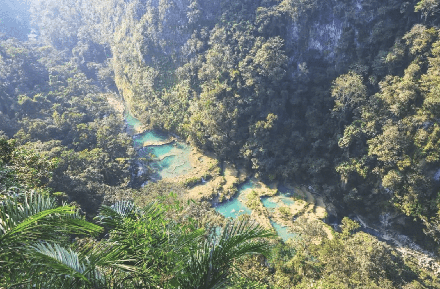 Semuc Champey, is a series of stunning turquoise limestone pools formed by the Cahabón River.