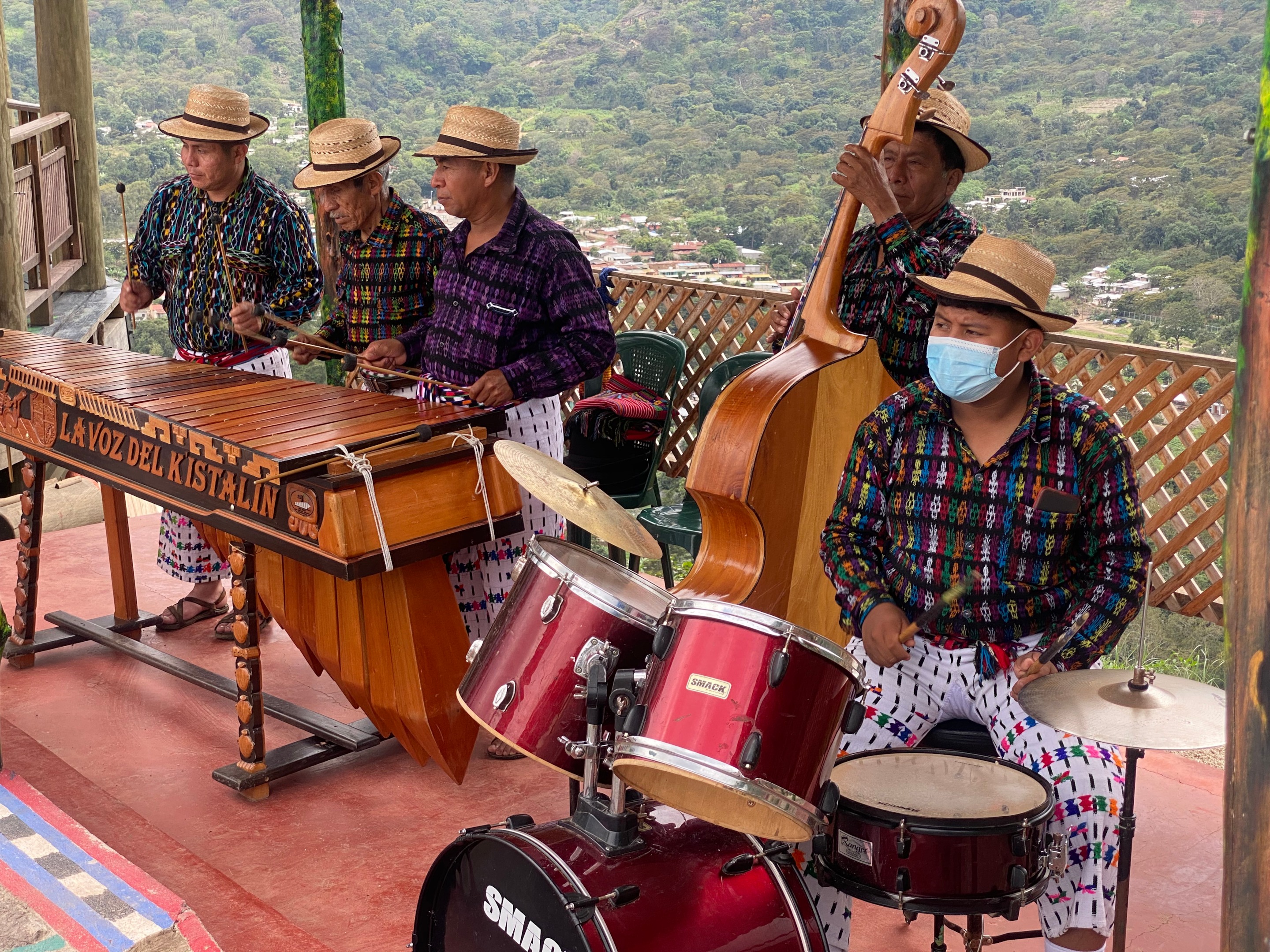 Folk band playing at a park.