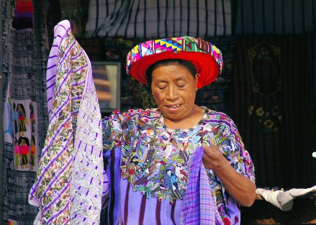 Indigenous woman in colorful traditional clothes.