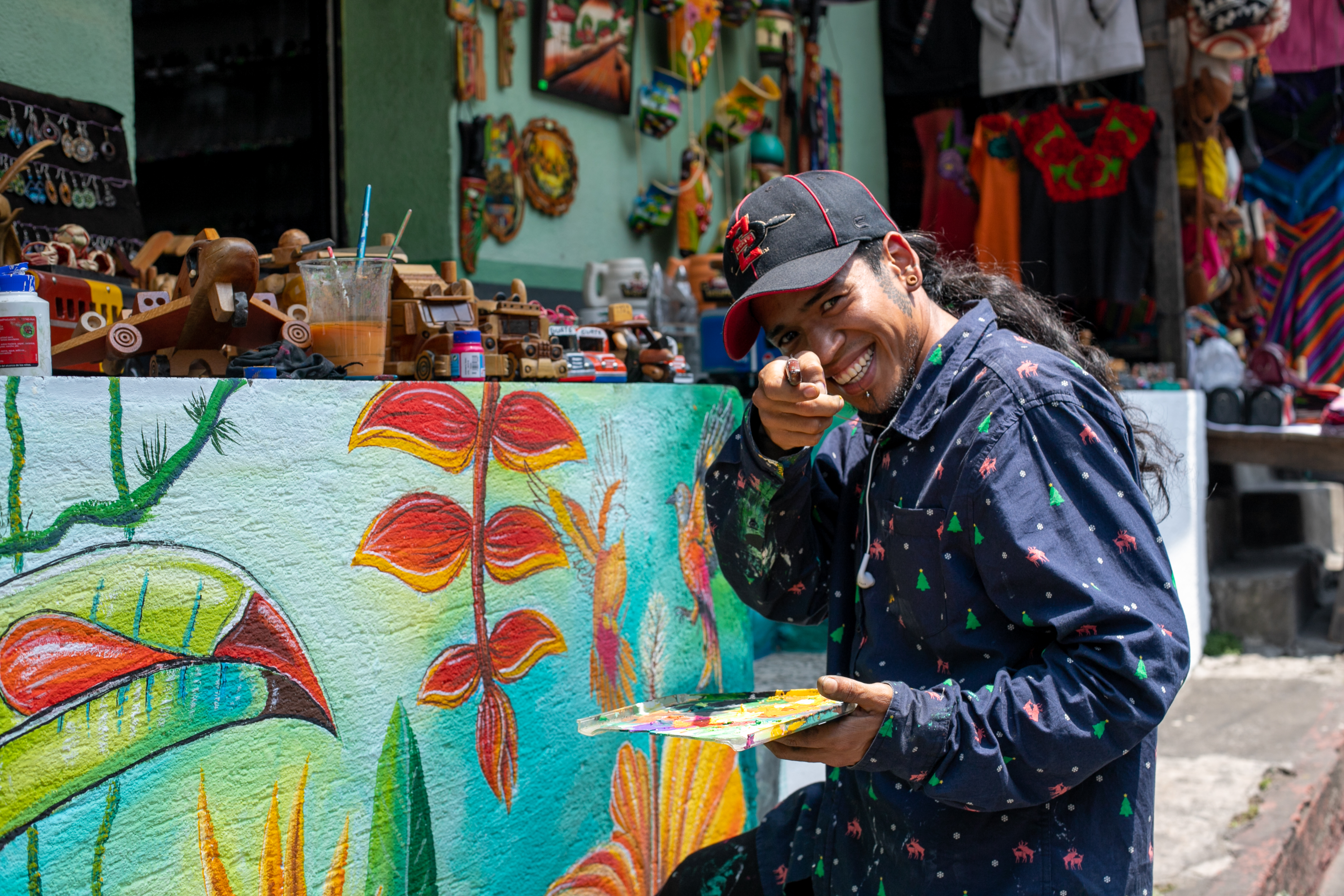 Local artist working on a mural.