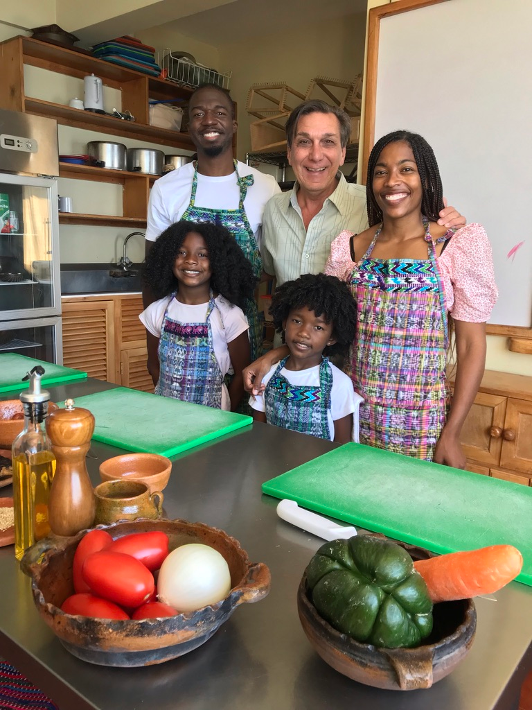 Family enjoying a cooking class in Santa Cruz la Laguna.